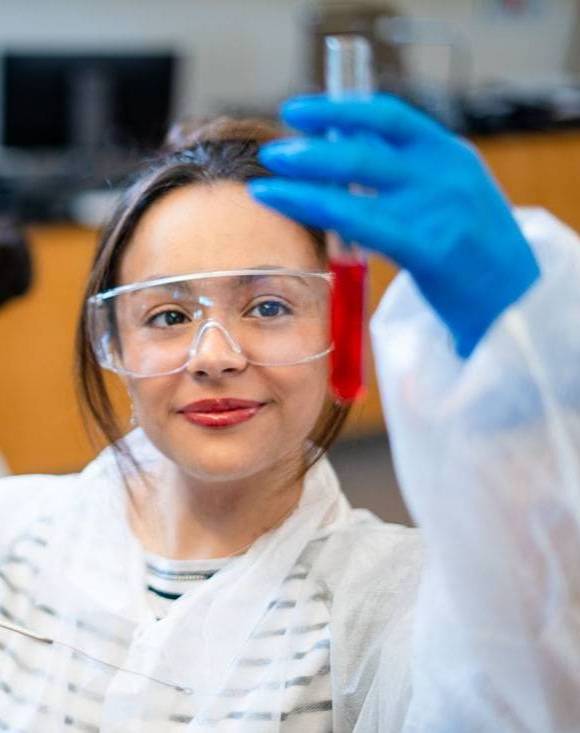 lab student holding beeker