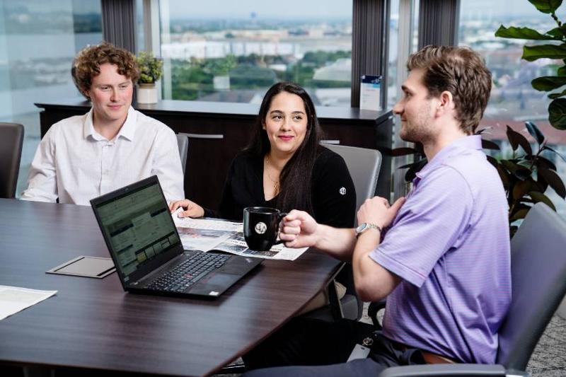 School of Business Accounting and MBA Graduate Virginia Loera with Colleagues at a Dallas Firm Offering Cybersecurity Services