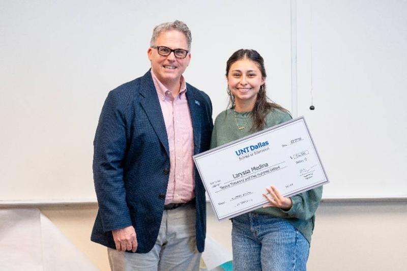 President Warren von Eschenbach with Student-Teacher Laryssa Medina