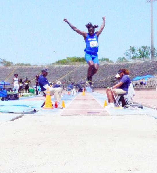 Bryson Mcrae Competing in the Long Jump Event at the RRAC Championships
