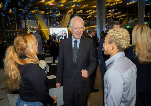 bob mong and two students