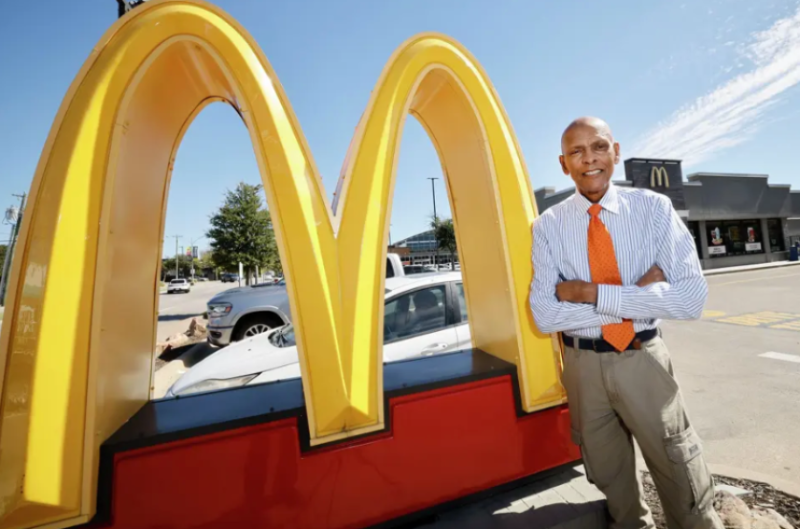 Roland Parrish Outside One of His McDonald's Restaurants (photo courtesy: The Dallas Morning News)