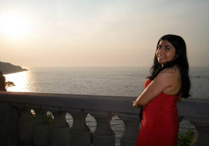 Pricila Fuentes Enjoys The View From a Coastal Vantage Point near Rome, Italy