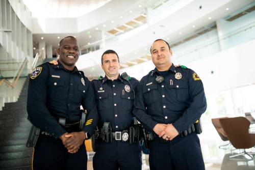 three officers on campus